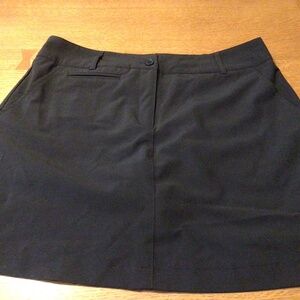 Black mini skirt/skort by Jones and Co.  Great condition.  Built in panty.